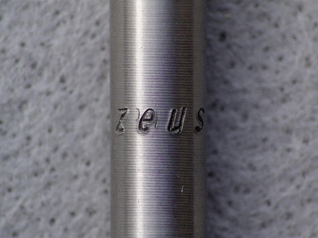 <------------------ SOLD ------------------> Zeus 2000 series front and rear axles - titanium (NOS)