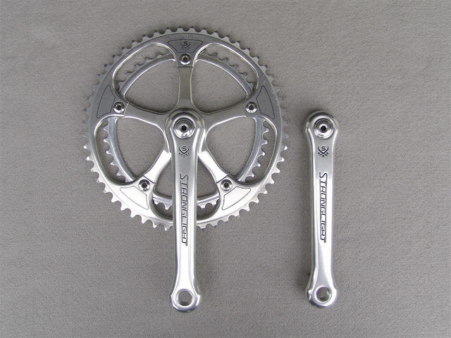 <------------------ SOLD ------------------> Stronglight 107 crankset - 42/52 double - 144 mm BCD (USED)