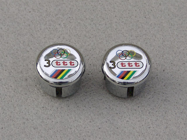 <------------------ SOLD ------------------> 3ttt handlebar end plugs - chrome - Olympic rings (NOS)