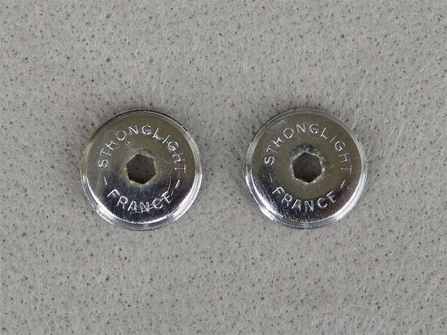 <------------------- SOLD -----------------> Stronglight crank arm dust caps (USED)
